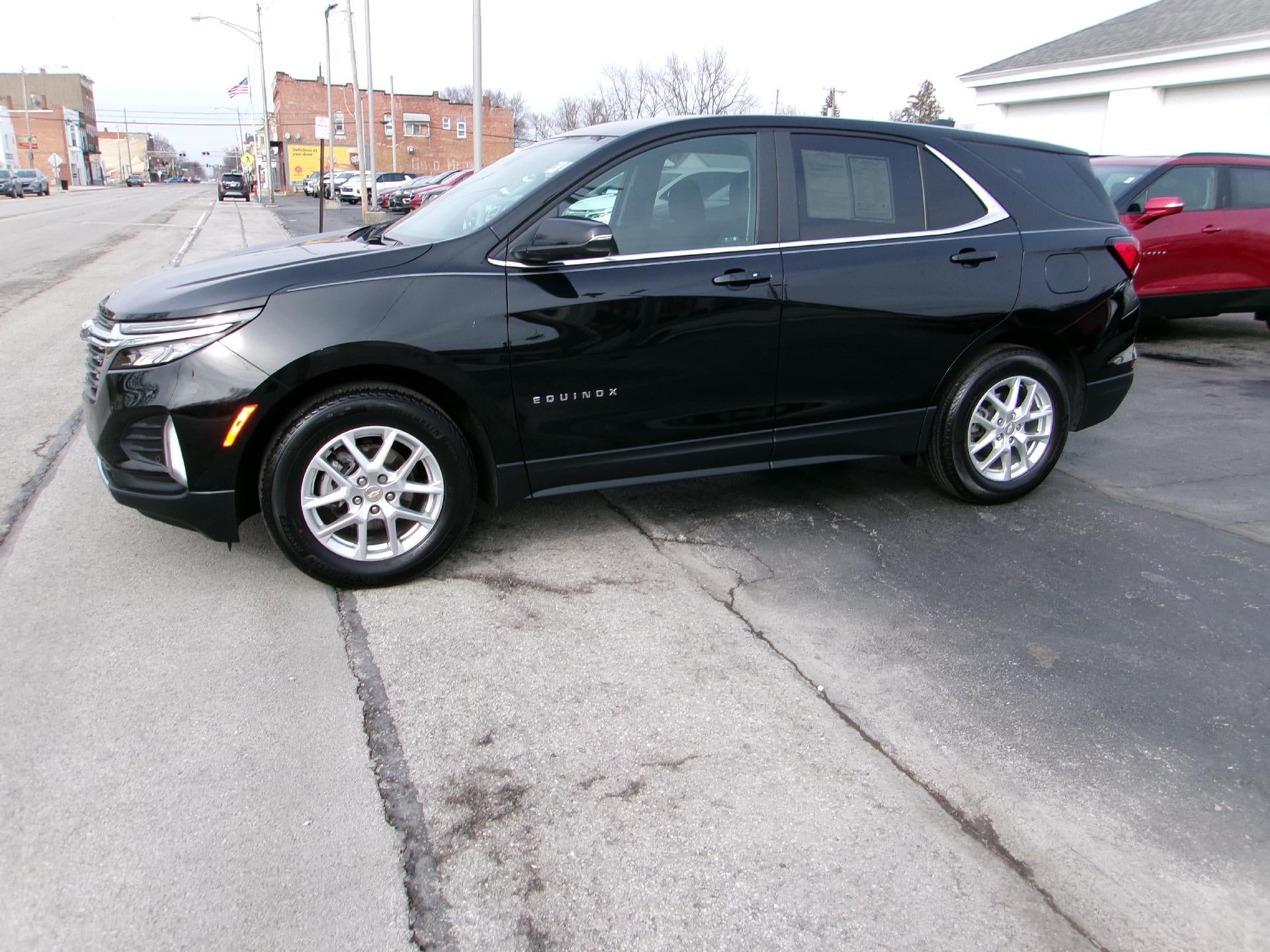 2024 Chevrolet Equinox LT in Mosaic Black Metallic — front three-quarter view