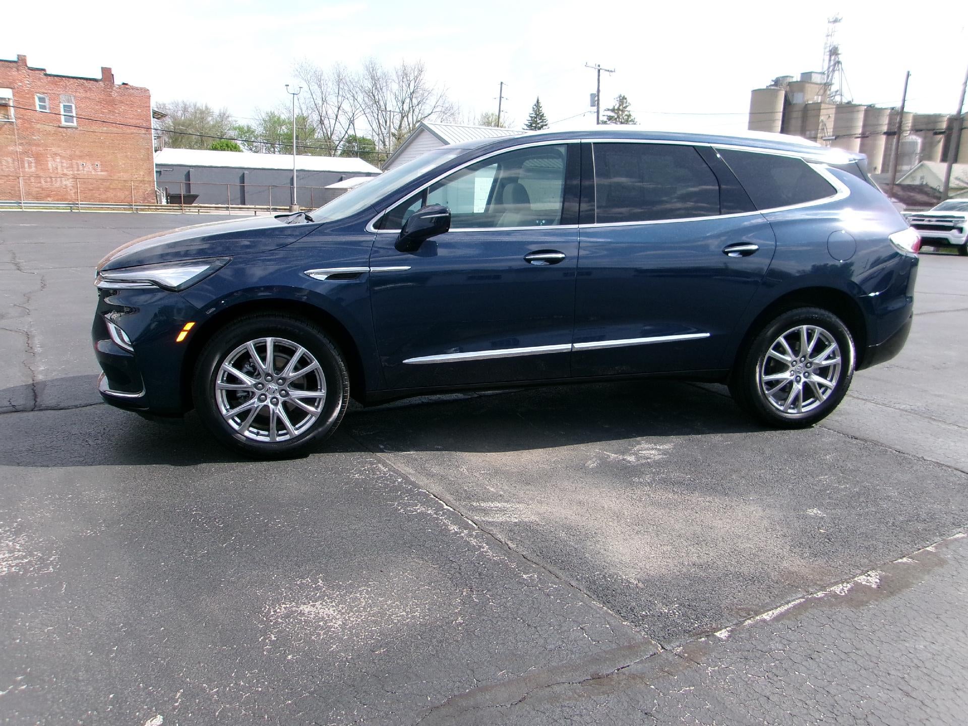 2023 Buick Enclave Essence in Emperor Blue Metallic — front three-quarter view